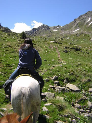Pujada a un coll d'alta muntanya a cavall